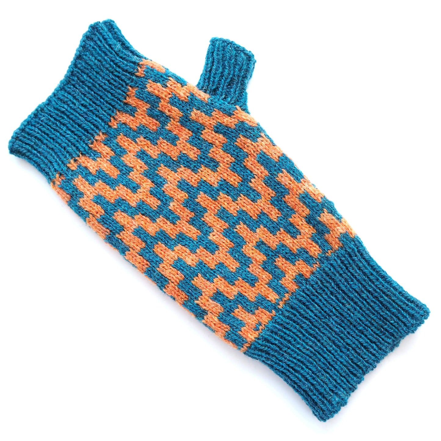 A fingerless glove by K.Moods, it is blue with a thick orange zig-zag pattern, and sits on a white background.